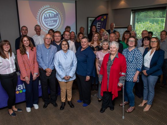 Group of involved customers at the conference